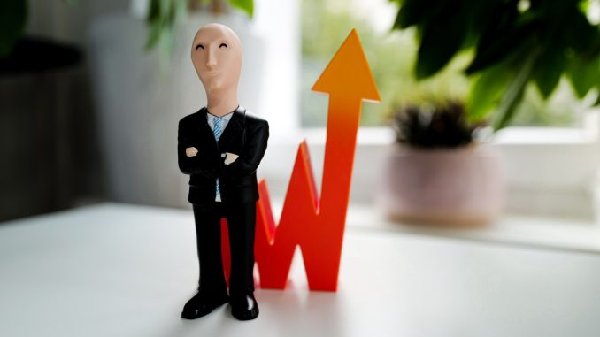 Photo by Gilly man in black suit jacket and black pants figurine